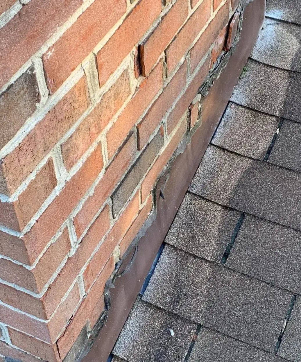 crumbling chimney made of brick from 1960's