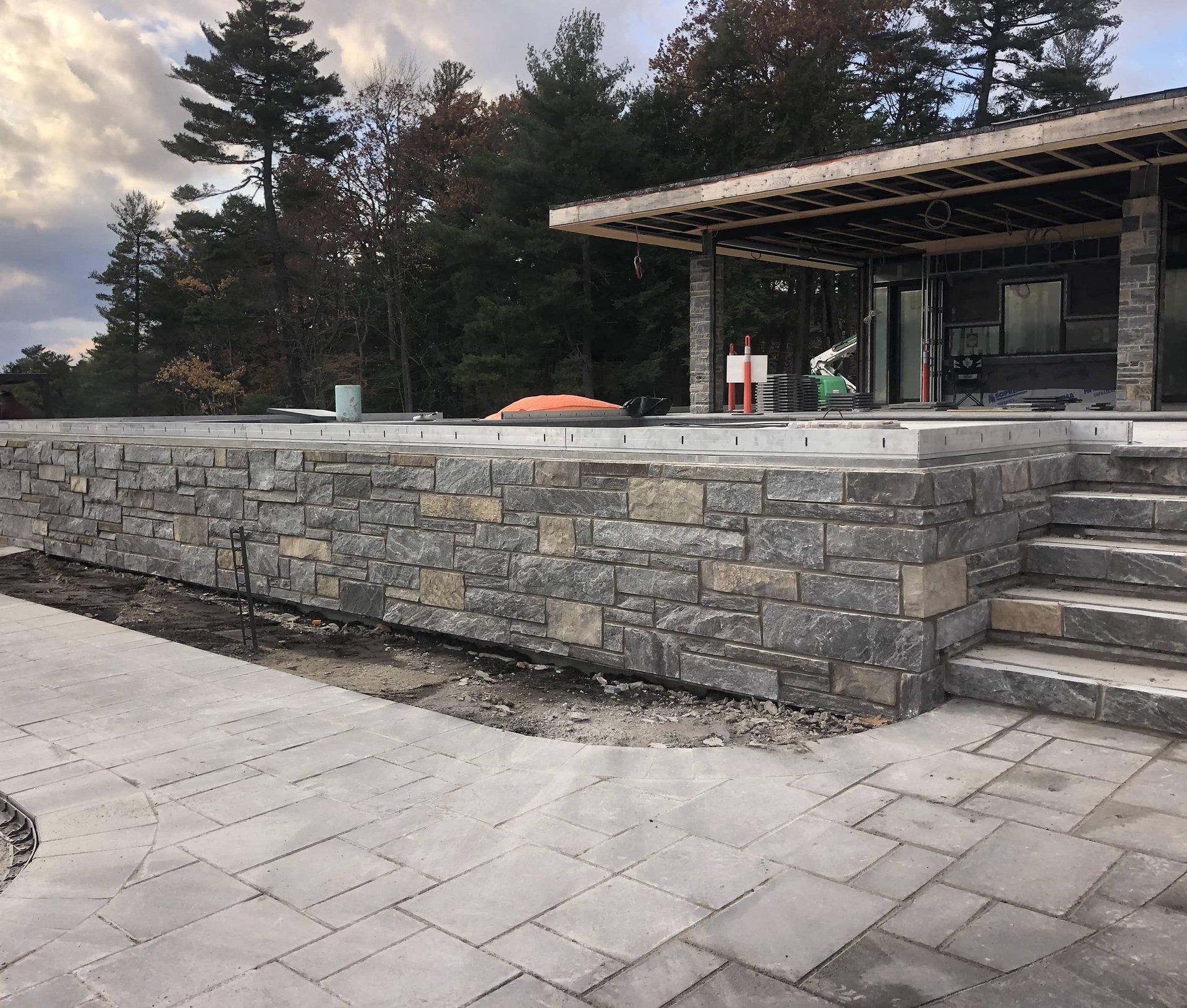 A natural stone retainer wall